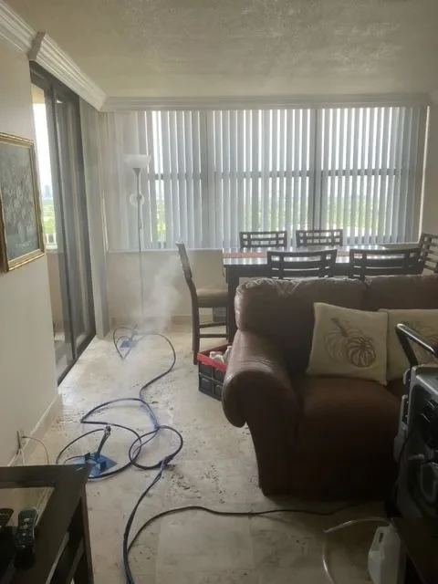 Living and dining room during a whole-home vapor treatment